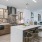 a kitchen with white cabinets