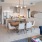 a living room with a dining table and couches