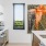 a kitchen with a painting on the wall