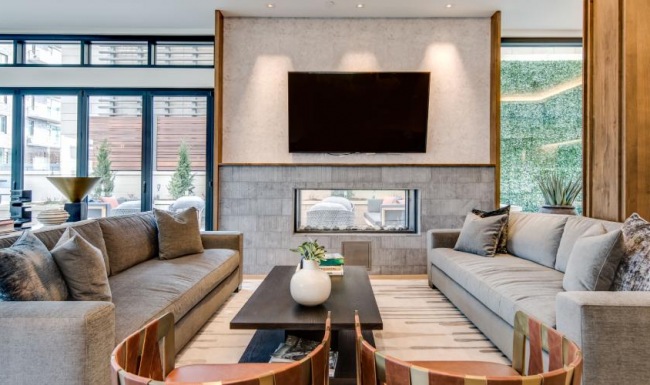 Find your perfect fit at St. Paul Collection a living room with a fireplace