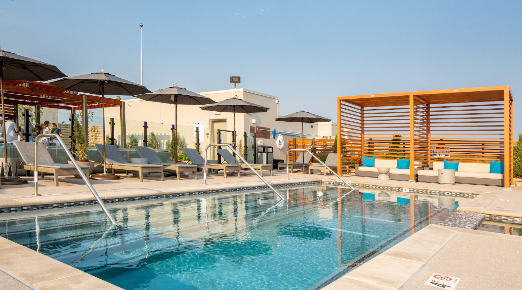 Sparkling swimming pool pool and cabana outside