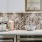 a kitchen with white cabinets
