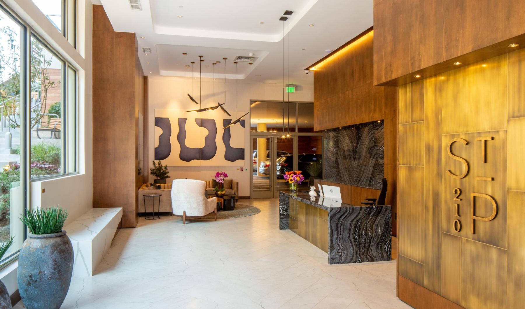 Find your perfect fit at St. Paul Collection a room with a couch and a table